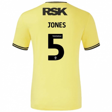 Kandiny Hombre Camiseta Lloyd Jones #5 Amarillo Negro 2ª Equipación 2024/25 La Camisa Chile